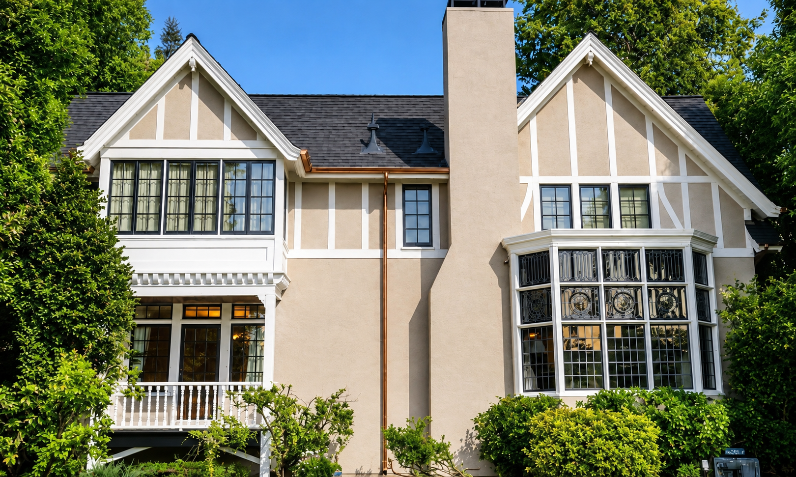 Dimension Painting exterior project with detailed Tudor trim